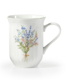 An inspiration for home chefs, Mikasa's Botanical Bouquet mug features everyday porcelain garnished with garden-fresh sage, rosemary and thyme. With gently fluted detail.