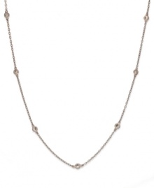 Sparkle by the inch. B. Brilliant's beautiful necklace features seven stations of round-cut cubic zirconias (3/4 ct. t.w.). Set in 18k rose gold over sterling silver. Approximate length: 18 inches.