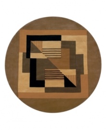 A round rug that is ideal for open spaces. Evoking the distinct, intricate artwork of cubism, this rug features rectangles, squares and triangles in rich brown hues, black and neutral tones. A light sienna border encompasses the center, finishing the rug with understated beauty. Hand-tufted and hand-carved of plush wool.