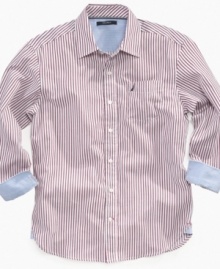 For a sporty and casual style, this vertical stripe dress shirt by Nautica goes great with jeans and chinos.