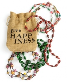 Happiness is in the bag with this double-stranded necklace, lovingly handcrafted in Rwanda. Colorful paper is cleverly re-purposed, rolled into all shapes and sizes then strung between tiny glass seed beads. Give to a friend or wear them all in one bold, meaningful statement. (Clearance)