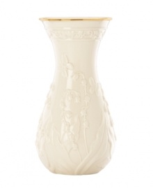 Lily of the valley springs from ivory porcelain, giving this Lenox Floral Meadow vase a delightfully understated grace. A band of sumptuous gold adds to its classic allure. Qualifies for Rebate