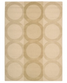 Geometric chic. Enhance your living area with the beautiful look and sheen of Nourison's Elements rug. Hand-loomed of plush wool for incredible texture, the luminous rug features an oversized ring motif across a soft beige background.