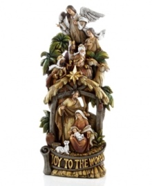 Mary, Joseph, the three magi, a shepherd, and an angel stand watch over the newborn in this nativity scene inscribed with the message Joy to the World. This hand-painted resin collectible by Napco is a beautiful reminder of why the holidays are so special.