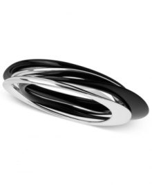 Robert Lee Morris brings depth without sacrificing style to the bangle. Crafted from silver- and hematite-tone mixed metal, the bracelet reflects an abstract design in a neoclassic model. Approximate diameter: 2-1/2 inches.