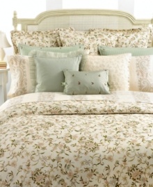 Classic paisley in soft colors alternates with a solid ivory stripe on these cotton sateen pillowcases, presenting a luxurious bedding addition from Lauren Ralph Lauren.