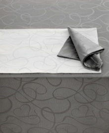 Sweet yet sophisticated, a flirty heart design twirls across this Love Story table runner from Mikasa. White and pewter linens are all dressed up with a radiant sheen, creating a fanciful backdrop for your finest occasions.