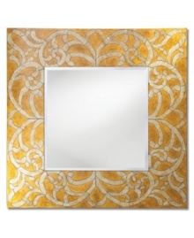 Silver-leaf vines curl in graceful symmetry against mottled gold leaf, giving the Lucia wall mirror a subtle radiance. A clean square shape lends this piece to modern living while the design itself is suitable for almost any decor.