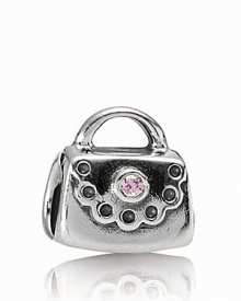 PANDORA's ladylike handbag charm gets a splash of color courtesy of pink cubic zirconia.