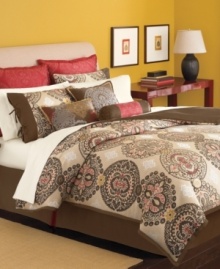 Eastern-inspired medallion designs pop with hints of vibrant red and metallic threads over sumptuous neutral colors. The Brick Lane comforter set from Martha Stewart Collection combines these lush colors with detailed embroidery and smooth ribbon trims upon accent pieces for a hint of feminine allure.