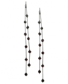 Fire up your evening with these two-row linear earrings from GUESS. Amythest, fuchsia and rose crystal-embellished fireballs hang from metal chains. Crafted in sprayed jet mixed metal. Approximate drop: 7 inches.