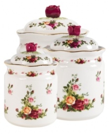 Blooming sprays of colorful roses accent this classic canister set. A rose-shaped pull and scalloped edge add extra charm.