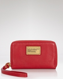 MARC BY MARC JACOBS' translates its always on-trend style to technology with this iPhone wristlet. Crafted of leather and accented by the designer's signature plaque, it's a case that's totally on point.