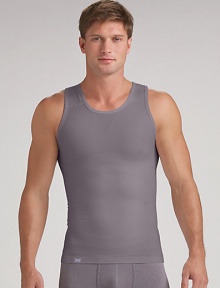 An essential underlayer or workout separate with an exclusive design that builds in physiotherapy taping techniques to gently pull the shoulders back and promote optimal alignment. Seamless stitching and targeted mesh provides a breathable, second skin fit. Micro polyester/nylon/spandex; machine wash Imported