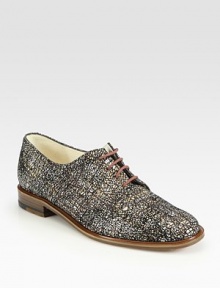 Oxford-inspired leather silhouette in a crackled goldtone print for modern appeal. Leather upperLeather lining and solePadded insoleMade in FranceOUR FIT MODEL RECOMMENDS ordering true size. 