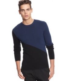 A luxe cotton blend in a colorblocked design. Style this Calvin Klein crew neck sweater with slim-cut trousers for a modern silhouette.