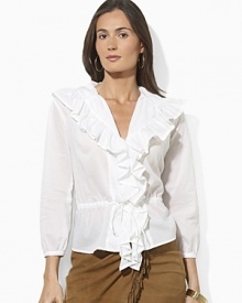 Delicate gathering and a breezy woven cotton construction lend feminine inspiration to a soft blouse.