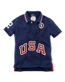 A breathable cotton mesh polo is accented with bold country embroidery, celebrating Team USA's participation in the 2012 Olympics.