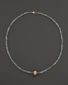 A lustrous champagne cultured freshwater pearl on a sparkling aquamarine necklace from Lara Gold for LTC.