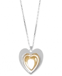 Even more to love. Robert Lee Morris' silver-plated necklace features a double heart pendant crafted from silver-tone and gold-tone metal for a stylish look. Approximate length: 32 inches + 3-inch extender. Approximate drop: 2-3/4 inches.