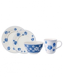 Vintage style meets modern durability in the Farmhouse Touch place settings. Villeroy & Boch paints a charming scene, mixing cornflower-blue laurels and blooms with embossed white accents in premium porcelain.