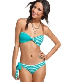 Roxy puts a new twist on the bikini top: this bandeau rocks a mix of solid color and stripes!