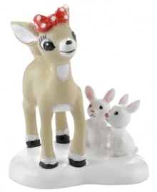 All kinds of cute. A doe-eyed deer fawns over Rudolph while two white rabbits vie for her attention in this porcelain figurine from North Pole Village, by Department 56.