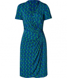 Issas effortlessly elegant signature draping and gathering are on full display with this bold, royal blue and green printed viscose jersey dress - Fitted, feminine cut fetchingly contours curves - Wrap-style bodice with deep v-neck and short sleeves - Slim, drape front skirt with decorative embellishment at hip - Hits at knee and zips at side - Ideal for any number occasions, seamlessly transitions from day to evening - Pair with platform pumps or strappy sandals and style with a cropped leather jacket