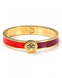 MARC BY MARC JACOBS' logo-stamped turnlock bangle is haute hardware for every day. In a nautical palette, the bright bauble loves striped boat neck tees and slim jeans.