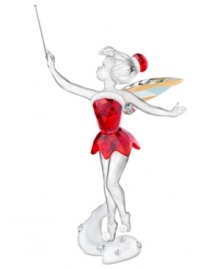 Disney's Tinker Bell takes a page from Mrs. Claus' book, dressed in a sparkling red dress and hat with platinum-white trim. Shimmering wings and a silver-tone metal wand topped with Swarovski crystal adds to the special holiday collectible.