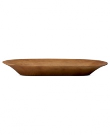 Carved by hand, this mango wood tray epitomizes the effortless sophistication of Donna Karan Lenox. Set the low Sculpted vase inside for striking contrast.