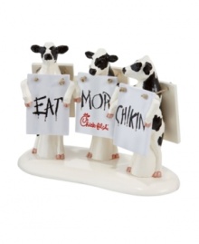 Three clever Chick-fil-A cows drive the message home, spreading their campaign to Eat Mor Chikin throughout Snow Village. From Department 56.