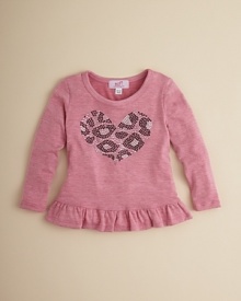 A classic longsleeve tunic is offered new life with ruffle trim and a leopard-print sequin heart centerpiece.