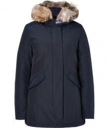 Sporty down-filled in midnight blue coated cotton - Classic by cult-label Woolrich, this parka keeps you warm in sub-zero temperatures - Genuine goose-down - snow-tight coating - Cozy, fur-lined hood - Zipper with additional button catch - Sleeves with air-tight cuffs - Great, butt-covering length - slim and waist-fitted, two lateral pockets - sporty shape - Dream-piece for life, once worn in winter you`ll never part from it again