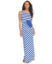 ECI adds an intriguing twist to this summery maxi--a solid, seamed panel at the waist swaps the direction of stripes for a kick of contrast at the bodice and skirt.