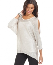 ECI's sweater features a dazzling drape and sparkling shimmer thanks to a sprinkling of sequins. The high-low hem gives the look a super modern feel.