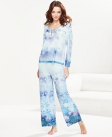 Embrace the lovely decorations of winter while staying warm and cozy in One World's Frozen Snowfall pajamas.