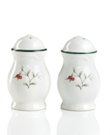 A charming addition to your Winterberry collection, these salt and pepper shakers from Pfaltzgraff's holiday collection of dinnerware and dishes offer an elegantly coordinated look for holiday entertaining. A traditional holly berry pattern is painted on the sides, accented by a curvy shape and decorative green rim. (Clearance)