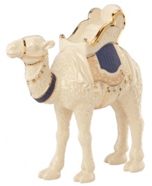 A stately figurine, this porcelain Nativity Camel from Lenox stands tall and proud with a basket and saddle blanket atop his arched back, trimmed in gold.