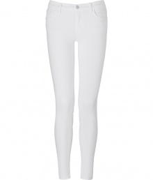 A tried and true favorite of the fashion set detailed in pristine white, these J Brand jeans are easy and flattering with a skinny leg and just the right amount of stretch - Classic five-pocket style, zip fly, button closure, belt loops - Slim fit - Wear with a pullover, leather jacket, and flats