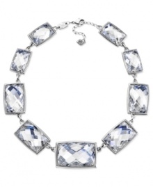 Defining elegance, Swarovski's Nirvana collar necklace is an enchanting accessory. Crafted from rhodium-plated mixed metal, bezel-set crystal diamond touch light adds a tranquil touch. Approximate length: 15 inches. Approximate drop: 1 inch.