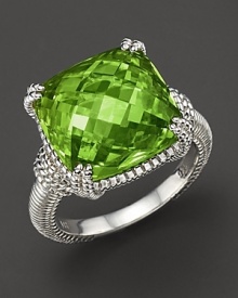 Intricately detailed sterling silver provides a gleaming backdrop for dramatic, cushion-cut peridot. By Judith Ripka.