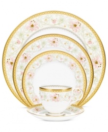 East meets West in the ornate Blooming Splendor place setting by Noritake. A Japanese-inspired pattern with raised dots encircles intricate florals rooted in white bone china.