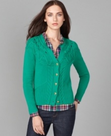 Get knitty and look pretty in this Tommy Hilfiger sweater, crafted in ribbed and cabled knit for a luxe handmade look.