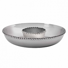 A new line of metal giftware, Facet, features an artisan look with intricate handcrafted detail. The jewel detail is inspired from Vera Wang's jewelry collection. These generously sized serving pieces are crafted from nickel plated brass.