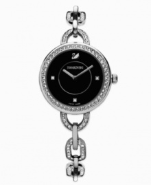 Playful sophistication, by Swarovski. Personalize this elegant Alia watch by adding your favorite charm or two at the case. Stainless steel bracelet and round case crystallized with Swarovski elements. Black sunray dial features Swarovski elements at three, six and nine o'clock, silver tone logo at twelve o'clock and two hands. Swiss quartz movement. Water resistant to 30 meters. Two-year limited warranty.