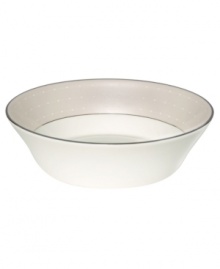 From soups to sundaes, this fine china bowl fits any serving. From innovative designer Monique Lhullier, it features a pearlescent border with glossy raised dots and a fine stitch-like pattern.