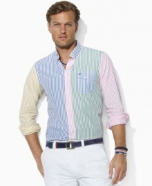 A classic color-blocked sport shirt is cut for a relaxed, comfortable fit and accented with multicolored stripes and Ralph Lauren's embroidered pony.