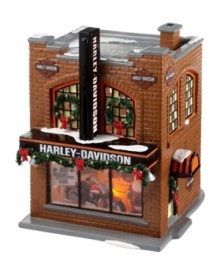 This Harley Davidson storefront combines real American spirit with the classic charm of Christmas. Snow-dusted garland, wintry wreaths and a warm brick design deck infuse this piece with small-town personality, while the front window showcases the legendary road warrior for all to see.