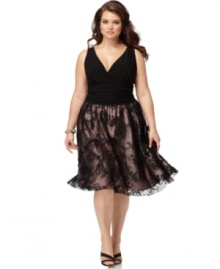 A shimmery hint of hue peeks through the floral-embellished sheer overlay on the skirt of this plus size SL Fashions dress.